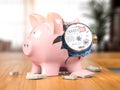 Water meter with piggy bank. Water consumption, cost of utilities and payment for water concept Royalty Free Stock Photo