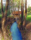 Water Mill in the forest with beautiful blue river