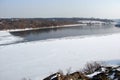 The water mirror is covered with ice of the Dnieper River near the Khortitsa Island in the frosty winter. city of Zaporozhye. Ukra Royalty Free Stock Photo