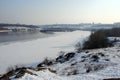 The water mirror is covered with ice of the Dnieper River near the Khortitsa Island in the frosty winter. city of Zaporozhye. Ukra Royalty Free Stock Photo