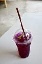 Water mixed with lemon juice and butterfly pea flowers drink Royalty Free Stock Photo