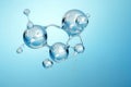 Water Molecule, Essence, And Bubble Are Rendered On Watery Backdrop Royalty Free Stock Photo