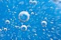 Water. Movement of air bubbles blue beautiful abstract underwater background Royalty Free Stock Photo