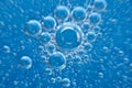 Water. Movement of air bubbles blue beautiful abstract underwater background Royalty Free Stock Photo