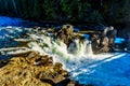 Water of the Murtle River tumbles over the edge of Whirlpool falls in the Cariboo Mountains of Wells Gray Provincial Park