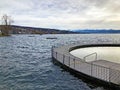 A water observation ZÃÂ¼richsee Kreisel post in Tiefenbrunnen public beach - ZÃÂ¼rich, Switzerland Royalty Free Stock Photo