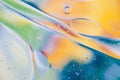 Water oil bubble macro abstract background flow liquid green blue yellow Royalty Free Stock Photo