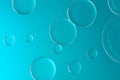 Water and oil on light blue background - Abstract macro Royalty Free Stock Photo