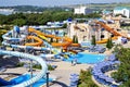 Water Park on the beach on a Sunny morning. Rides in the form of spiral pipes.