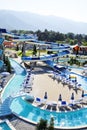 Water Park on the beach on a Sunny morning. Rides in the form of spiral pipes.