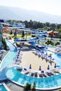 Water Park on the beach on a Sunny morning. Rides in the form of spiral pipes.