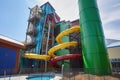 water park with flume water slide, twisting and turning its way down the side of the building