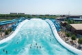 water park with giant wave pool, where visitors can ride waves of water