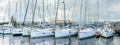 Water park, moored boats and sailboats in the sea port of Lemmer