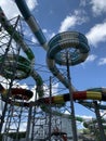 Water park slides against the blue sky. Modern water park with colorful slides. Summer Amusement Park, water attraction Royalty Free Stock Photo