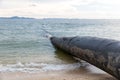 Water pipe going into the Atlantic ocean. Sea water intake pipe at the beach