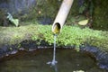 Water pipe in Japanese garden Royalty Free Stock Photo