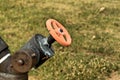 A water pipes on the green grass Royalty Free Stock Photo