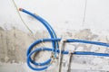 Water pipes made of polypropylene PEX in the wall, plumbing in the house. Installation of sewer pipes in a bathroom of an apartmen