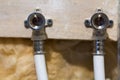 Water pipes made of polypropylene in the wall, plumbing in the house. Installation of sewer pipes in a bathroom of an apartment in Royalty Free Stock Photo