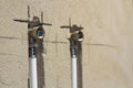 Water pipes made of polypropylene in the wall, plumbing in the house. Installation of sewer pipes in a bathroom of an apartment in Royalty Free Stock Photo