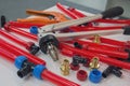 Water pipes PEX and mounting tools on the table Royalty Free Stock Photo