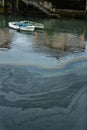 Water pollution in pier caused by oil