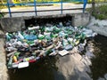 Water pollution, plastic bottles and garbage on river surface Royalty Free Stock Photo