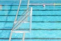 Water polo goal and ball in swimming pool Royalty Free Stock Photo
