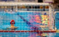 Water-polo match with goalkeeper in gate Royalty Free Stock Photo