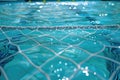 water polo net sitting within the vibrant blue waters of a pool Royalty Free Stock Photo