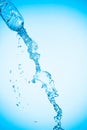 Water is poured out of a plastic bottle Royalty Free Stock Photo