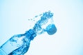 Water is poured out of a plastic bottle Royalty Free Stock Photo
