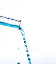 Water pouring out of a glass bottle Royalty Free Stock Photo