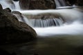 Water pouring over a rock Royalty Free Stock Photo