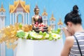 Water pouring to Buddha statue in Songkran festival tradition of Royalty Free Stock Photo