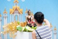 Water pouring to Buddha statue in Songkran festival tradition of Royalty Free Stock Photo