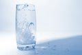 water pouring in transparent glass with bubbles of air Royalty Free Stock Photo