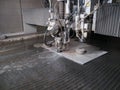 Water pressure cutting through stainless steel materials