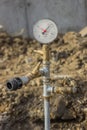 Water pressure gauge for pressure testing of water main Royalty Free Stock Photo