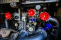 Water pump and other technical devices in the fire machine for extinguishing a fire, close up Royalty Free Stock Photo