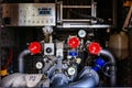 Water pump and other technical devices in the fire machine for extinguishing a fire, close up Royalty Free Stock Photo