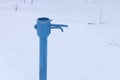 Water pump on the street in winter Royalty Free Stock Photo