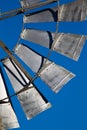Water pump windmill metal vanes Royalty Free Stock Photo