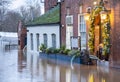 Water pumps in flooded property, from burst banks of the River Severn cause chaos for Worcester businesses.bus