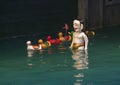 Water puppet ducks and a water puppet man in the Thang Long Water Puppet Theatre, Hanoi, Vietnam