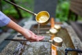 Water purification at entrance of the Japanese temple Royalty Free Stock Photo