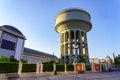 Water purification tower in Plaza Castilla in Madrid at dawn on a sunny day.