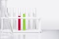 Water quality monitoring in chemical laboratories. The red chemical in the test tube has a high PH ranges value Acids Strength.