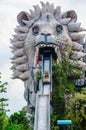 Water rafting machine running out from the mouth of giant lion sculpture at Siam Park City, is a world-class amusement.